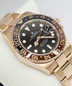 Rolex GMT Master II "Rootbeer", in 18ct Everose gold, Black index dial on a Rolex Oyster Bracelet in 18ct Everose gold. Ref 126715CHNR, Current, with Box & Papers