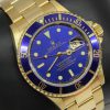 Rolex Submariner Date in 18ct Yellow Gold on 18ct Yellow Gold Rolex Oyster bracelet, Blue Dial & Bezel, ref: 16618, Circa: 2002, with Box