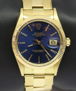 Rolex Oyster Perpetual Date in 14ct Yellow Gold with Blue index Dial 34mm on 14ct Yellow Gold Oyster Bracelet, Ca. 1981 Ref: 15037