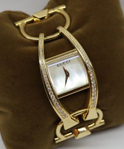 Gucci Chido 18ct Yellow Gold Bracelet Watch With 64 Round brilliant cut diamonds VVS1 clarity, F color total weight approx. .87ct, Mother of Pearl Dial, with Box