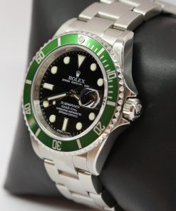 Alternative view of Rolex Submariner Date "Kermit". Green bezel and black index dial.  Stainless steel case and Rolex Oyster Bracelet, Ref: 16610LV, M Serial circa: 2008, Engraved Rehaut, with Box & Rolex Service Card