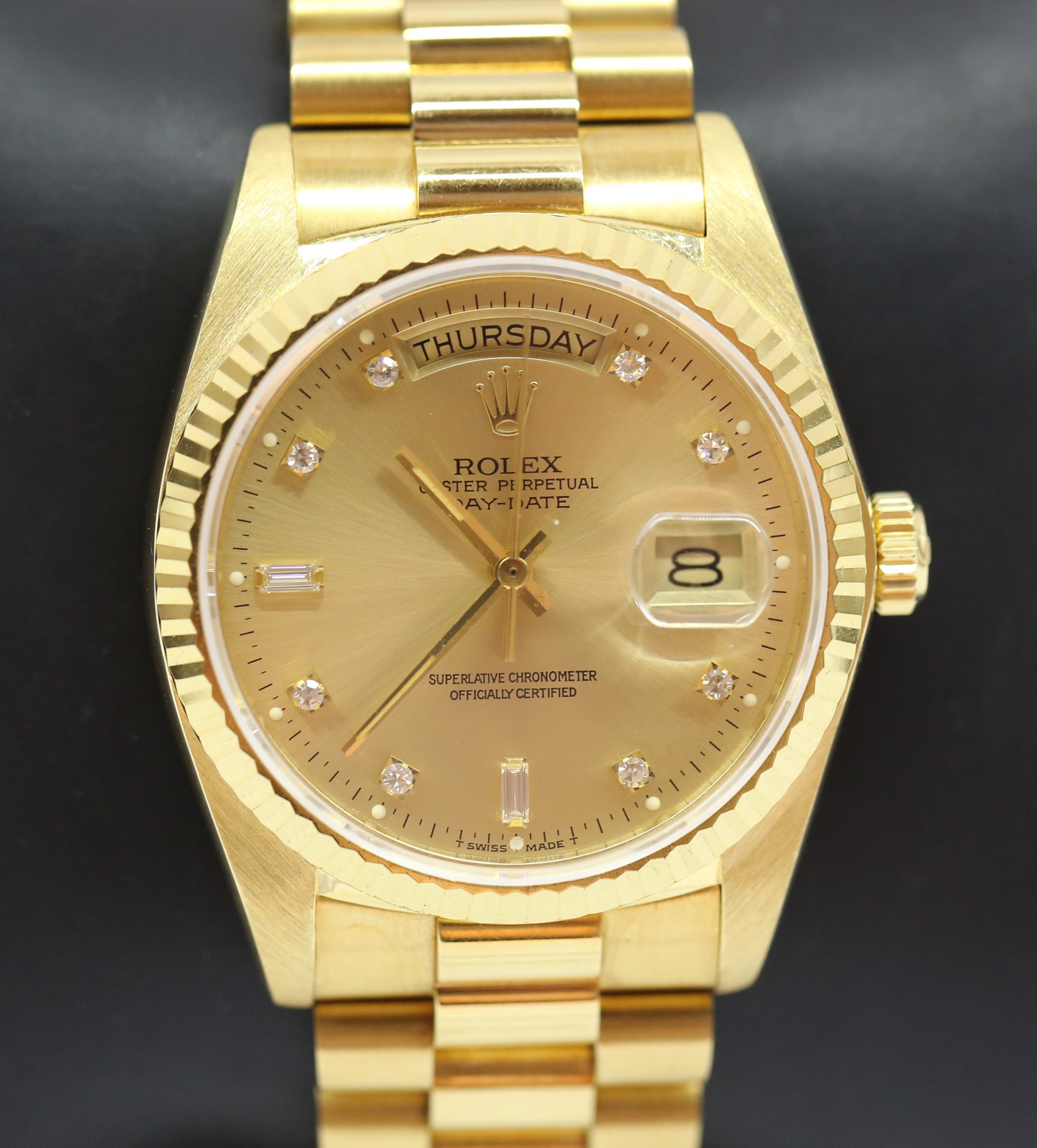 Rolex Oyster Perpetual Day Date in 18ct Yellow Gold on 18ct Yellow Gold Rolex President Bracelet, reference: 18038, Champagne Diamond Dial, Circa: 1981