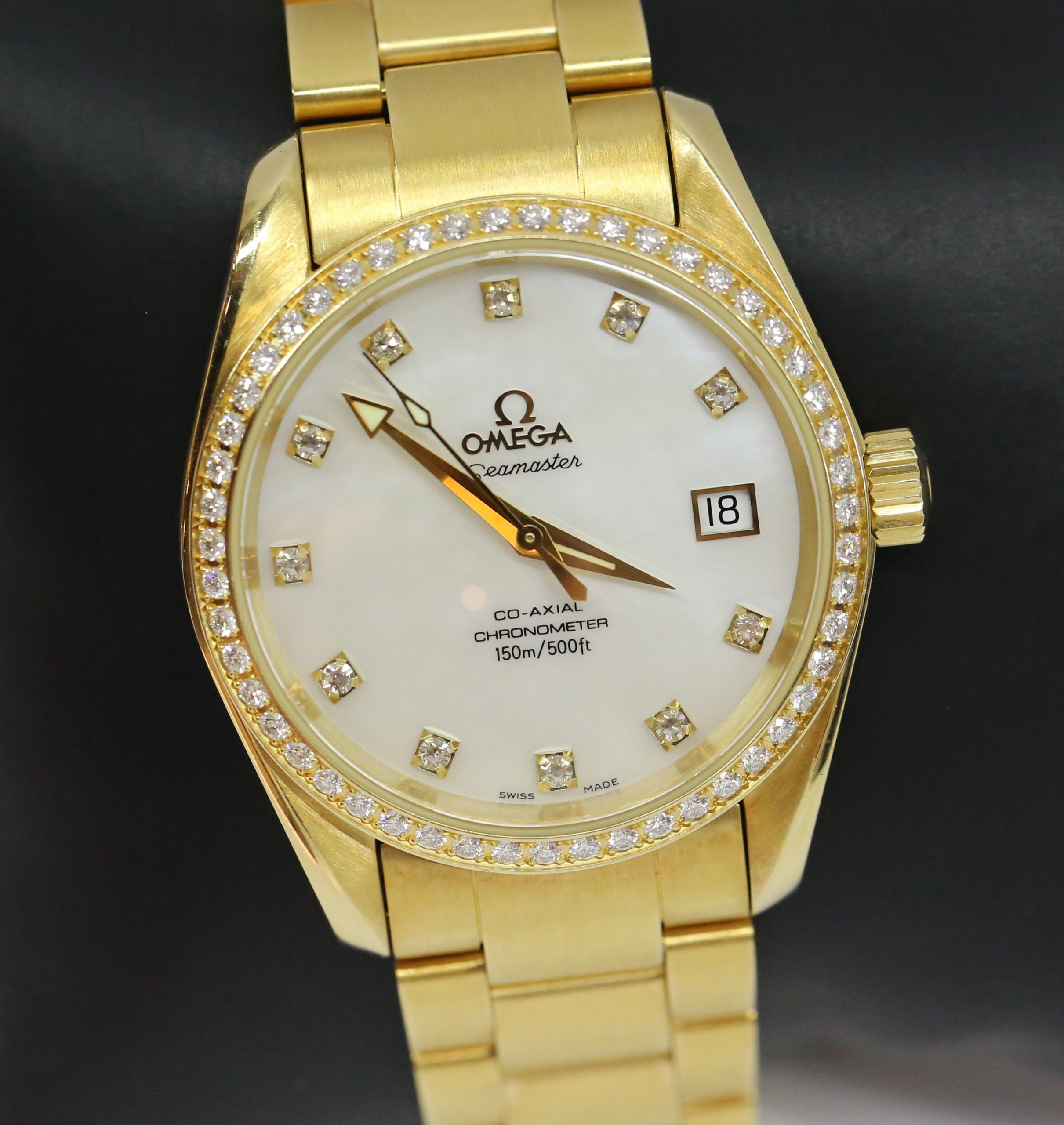 Omega Aqua Terra 36.2mm in 18k Solid Yellow Gold with Diamond Bezel and Mother of Peral Diamond Dial Complete with Box and Papers Ref. 2009.75.00 Circa: 2005