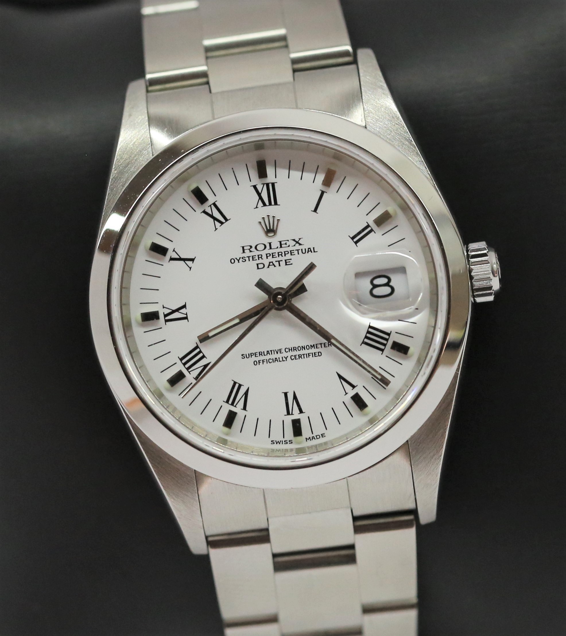 Rolex Oyster Perpetual Date in Stainless Steel on Rolex Stainless Steel Oyster Bracelet, White Roman Dial, Ref: 15200, Circa 2002, Complete with Box & Papers
