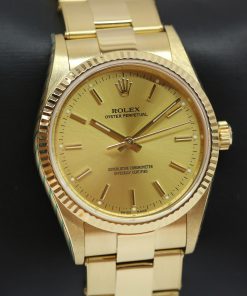 Rolex Oyster Perpetual 34mm in 18ct Yellow Gold, Champagne index dial on Rolex 18ct yellow gold rivited bracelet, Ref: 14328, Circa: 1984, Just Returned From Rolex Service, Balance of Rolex Service Warranty
