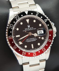 Rolex GMT Master II in Stainless Steel with Black/Red Bezel, Black Index Dial on Rolex Oyster Bracelet, Ref: 16710, L Serial, Circa: 1990, Complete with Box, Papers & Rolex Service Card