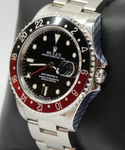 Alternative view of Rolex GMT Master II in Stainless Steel with Black/Red Bezel, Black Index Dial on Rolex Oyster Bracelet, Ref: 16710, L Serial, Circa: 1990, Complete with Box, Papers & Rolex Service Card