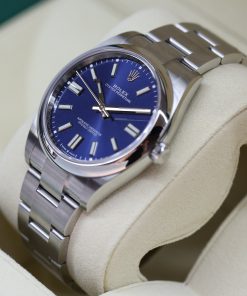 Alternative view of Rolex Oyster Perpetual 41mm in stainless steel on a Rolex Oystersteel bracelet. Blue index Dial. Ref: 124300, Circa: 2021, Complete with Box and Papers