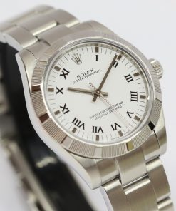 Rolex Oyster Perpetual 31mm Stainless Steel, White Roman Dial with an Engine Turned Bezel on a Stainless Steel Oyster Bracelet, Ref: 177210, Circa: 2010, Complete with Box & Papers