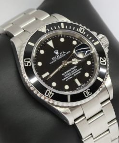 Rolex Submariner Date, Stainless Steel on Rolex Oyster Bracelet, Black Index Dial, Reference: 16610, Circa 2000