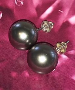 Pair of Tahitian black pearl studs, 11mm in diameter, uniform round with good lustre.