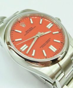 Rolex Oyster Perpetual 41, Coral Red dial, Reference 124300, Ca 2021, original box and warranty card.