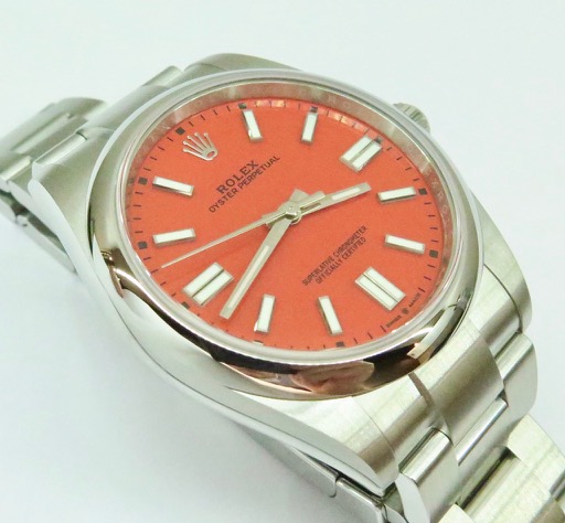 Rolex Oyster Perpetual 41, Coral Red dial, Reference 124300, Ca 2021, original box and warranty card.