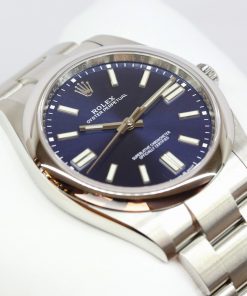 Rolex Oyster Perpetual 41mm in stainless steel on a Rolex Oystersteel bracelet. Blue index Dial. Ref: 124300, Circa: 2021, Complete with Box and Papers