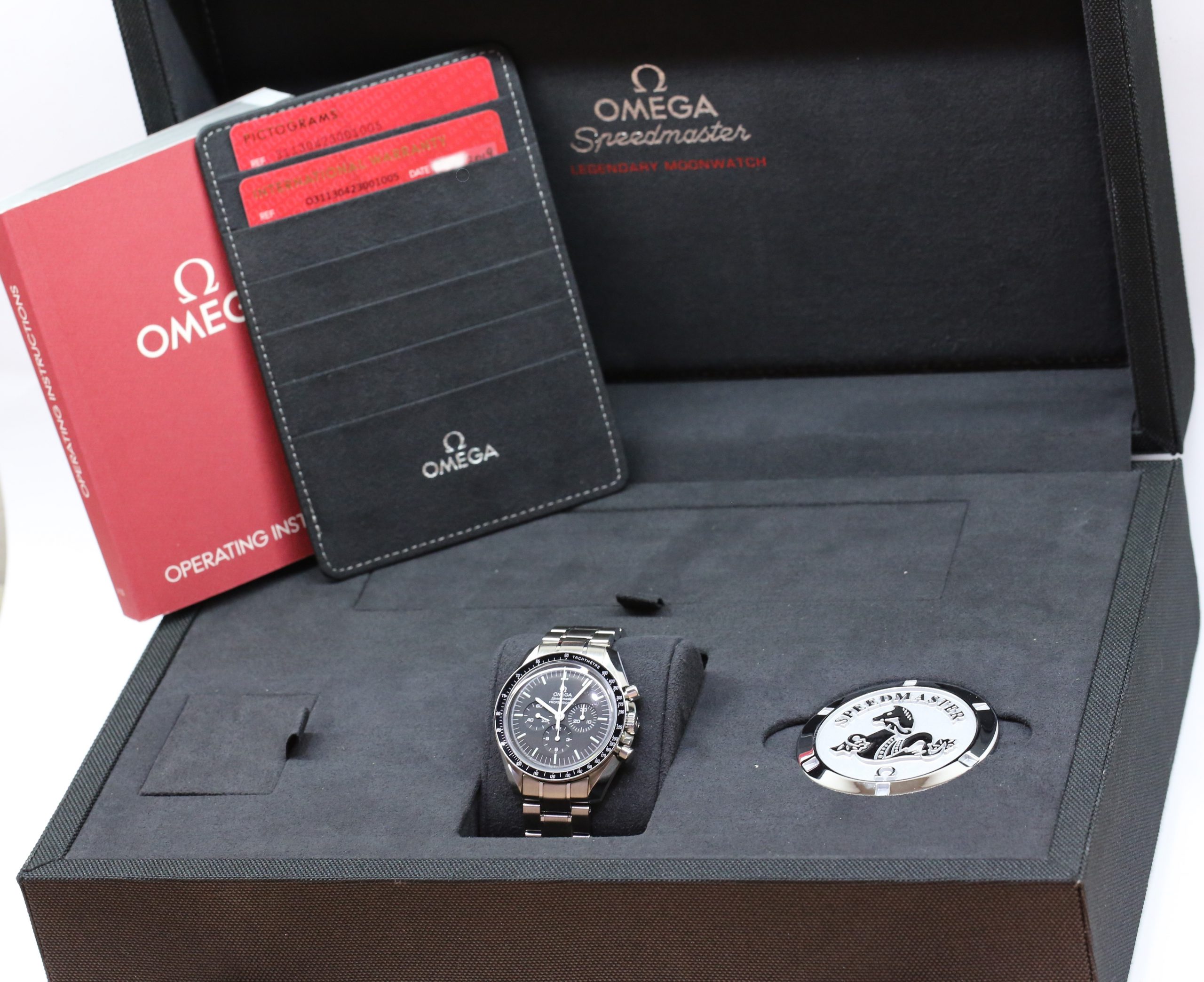 Omega Speedmaster Professional 42mm in stainless steel, Black index dial on a Omega stainless steel bracelet. Ref. 31130423001005, Complete with all Boxes and Omega Warranty cards, Circa: 2019 - Image 7
