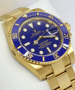 Rolex Submariner Date 18ct Yellow Gold Factory Stickers, Blue Index Dial, on 18ct Yellow Gold Rolex Oyster Bracelet, Ref: 116618, Circa: 2009, Complete with Box & Papers