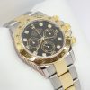Rolex Cosmograph Daytona in 18ct Yellow Gold and Stainless Steel with Black Diamond Dial on Rolex 18ct Yellow Gold and Stainless Steel Bracelet  Ref. 116523 Circa: 2003 Complete with Box and Papers Just Returned from Rolex Service Centre