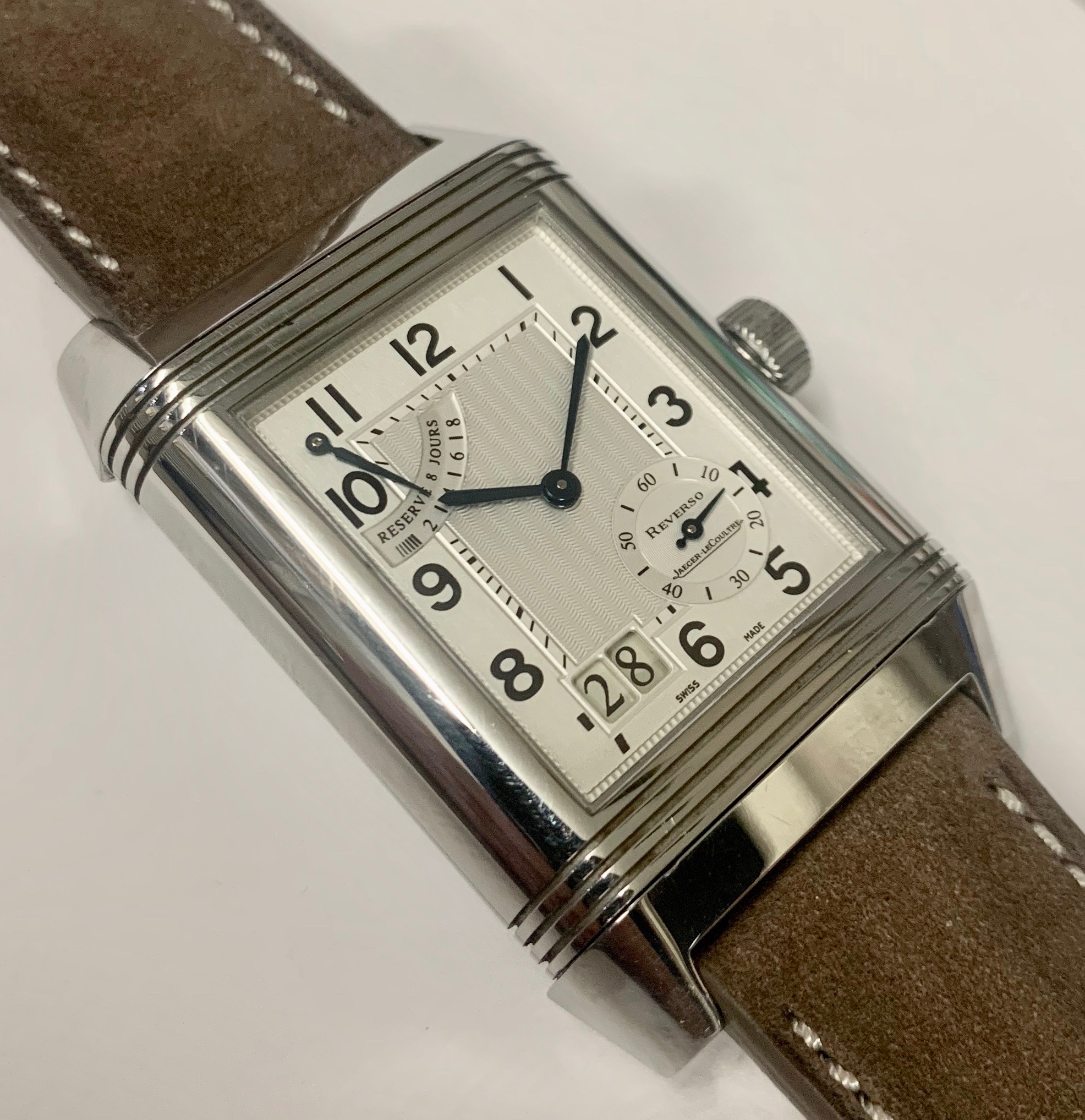 Jaeger Le Coultre Reverso Grande Date 8 Day Power Reserve in Stainless Steel, Guilloche Dial, on Seude Strap Ref 3008420, Circa: 2000s, Complete with Box and Papers.