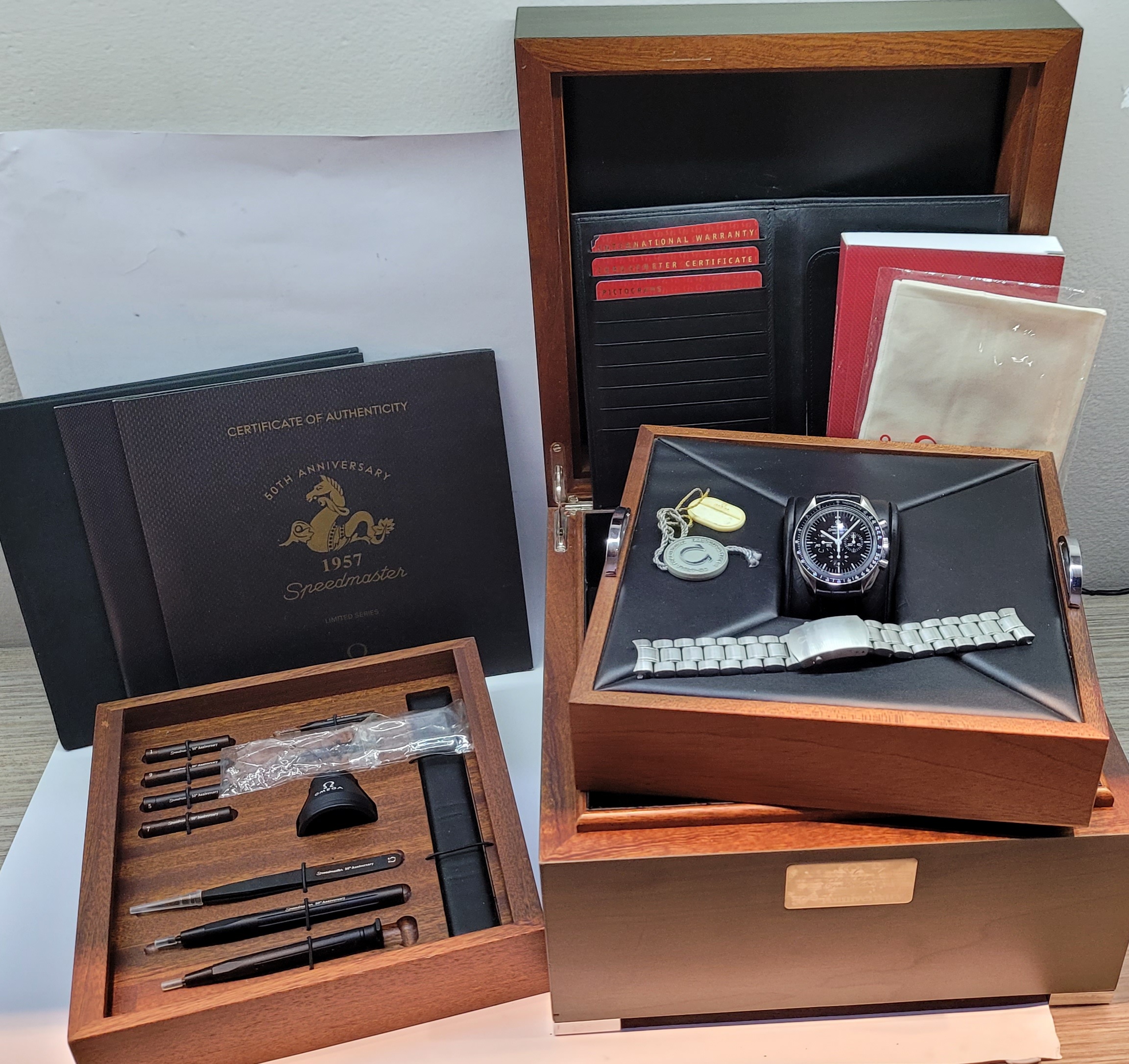 Omega Speedmaster in stainless steel, 50th Anniversary Limited Edition series of 1,957 Black index dial, on an Omega bracelet, Ref: 31133425001001 Ca. 01-06-2011 comes with tool kit, box and books. - Image 7