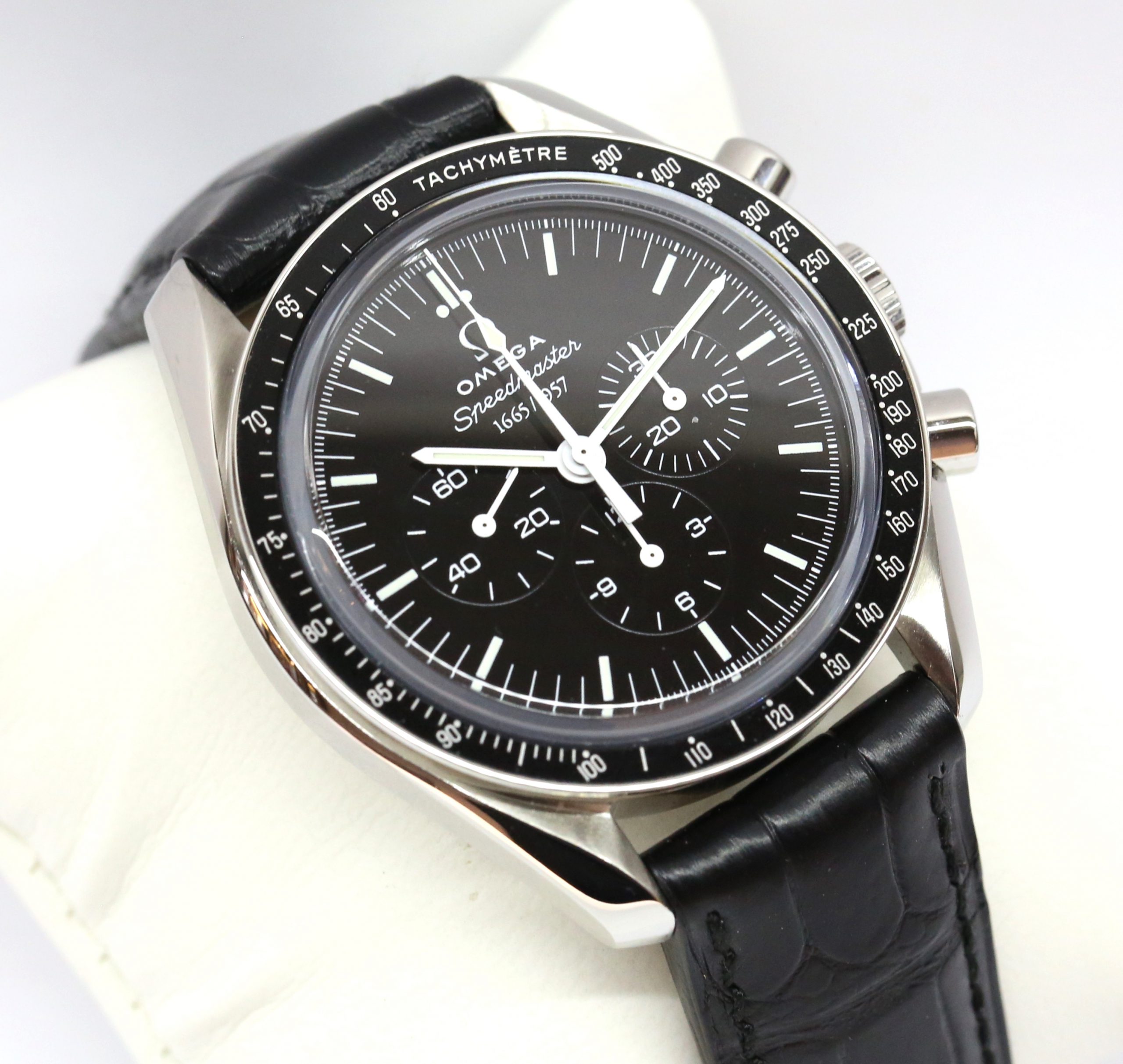 Omega Speedmaster in stainless steel, 50th Anniversary Limited Edition series of 1,957 Black index dial, on an Omega bracelet, Ref: 31133425001001 Ca. 01-06-2011 comes with tool kit, box and books.
