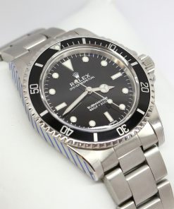 Rolex Submariner (non-date) in Stainless Steel, Black index dial and Black Divers bezel on Rolex Oyster Band Ref: 5513 Circa. 1989 with Rolex Service Warranty Card