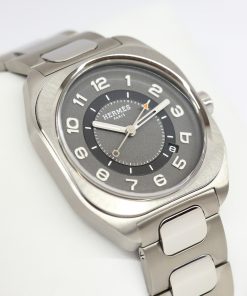 HERMÈS, H08 watch in Titanium, Gray / Black arab dial on a integrated titanium bracelet box and books, Ref: SP1.741,  Circa: 2021