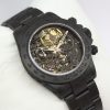 Rolex Daytona modified by "Mad Paris Revolt Skull" in black PVD stainless steel, skeleton dial, modified caseback on a modified Rolex oyster bracelet with engraved skulls. Ref:116520, Ca. 2009