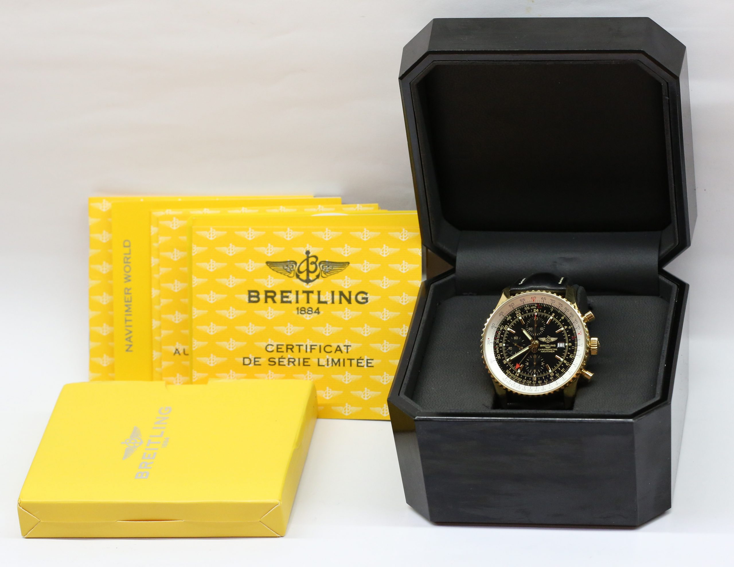 Breitling Navitimer World in 18ct Yellow Gold, Black index dial with a white slide rule, Limited Edition of 100 Pieces, Reference K24322, Circa: 2006, Complete with Box & Papers - Image 7