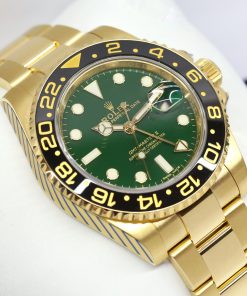 Rolex Oyster Perpetual GMT in 18ct Yellow Gold with Green Dial on Rolex Oyster Bracelet Ref. 116718LN Complete with Box and Papers