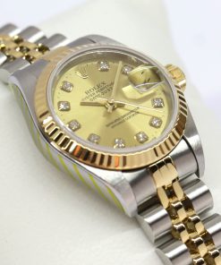 Rolex Oyster Perpetual Lady Datejust 26 in Stainless Steel and 18k Yellow Gold on steel & gold Jubilee bracelet with a champagne diamond dial, Ref: 79173, Circa: 2000, Complete with Box & Papers, Just Returned From a Rolex Service