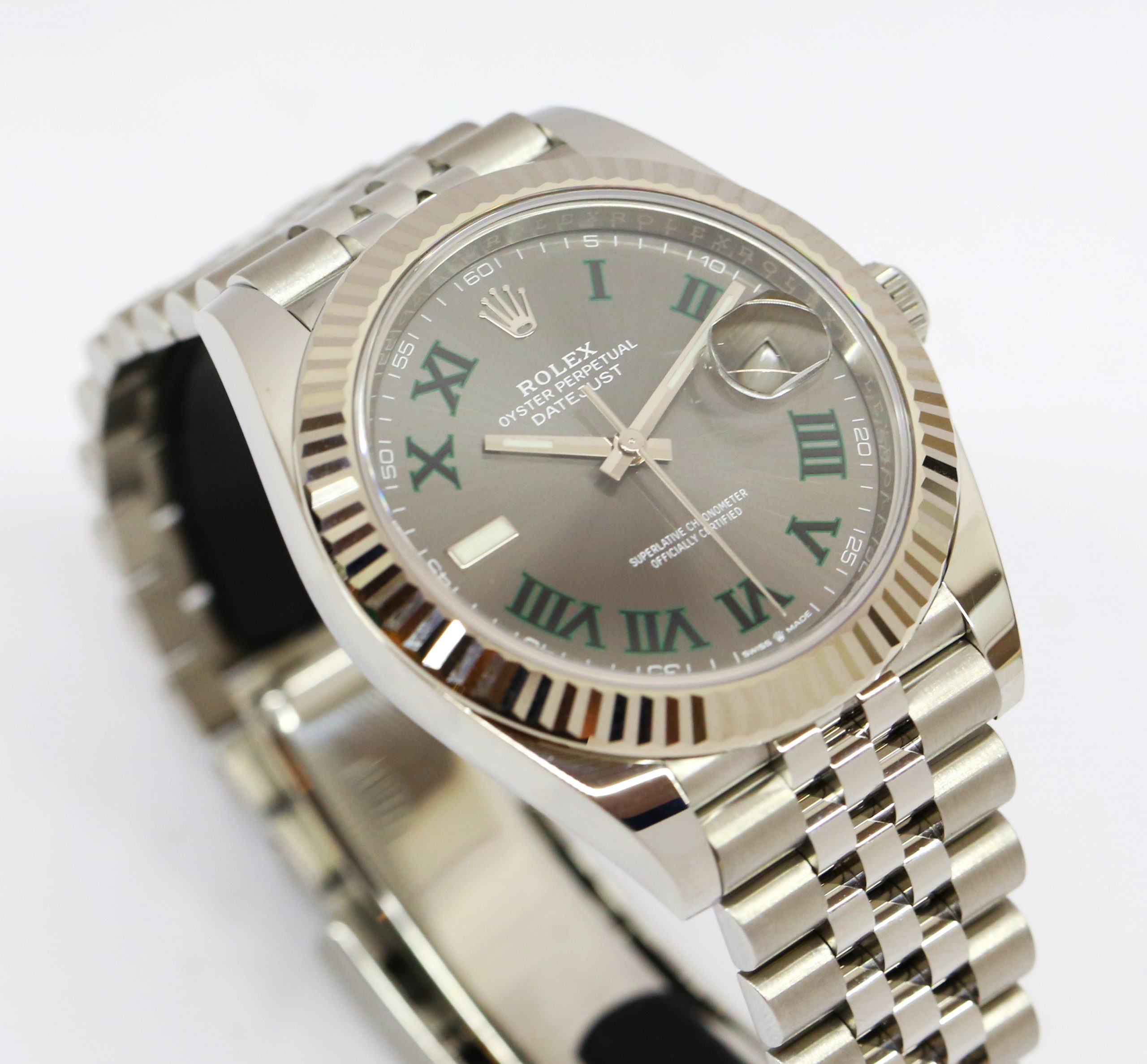 Rolex Datejust 41, Stainless Steel with 18ct White Gold Fluted Bezel, Wimbeldon Dial, on Rolex Jubilee Bracelet, Reference 126334, Circa: 2021, Complete with Box & Papers