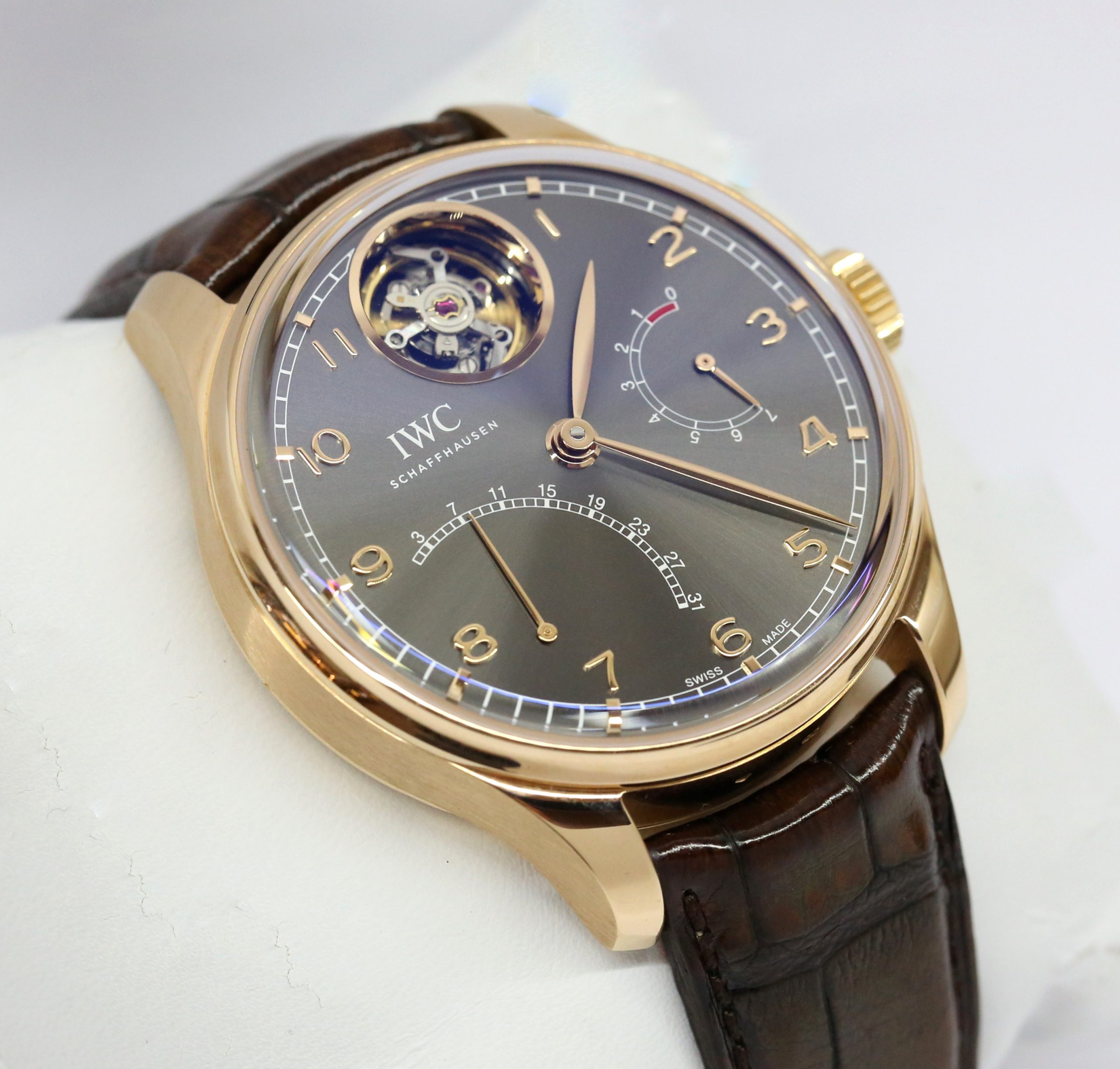IWC Portugieser Tourbillon Mystère Rétrograde in 18ct Rose Gold with Rodium Arabic Markers Dial and Tourbillon Display Window on IWC Brown Alligator strap with IWC 18ct Rose Gold Deployant Buckle Ref. IW504602 Circa: 2022 Complete with Box and Papers