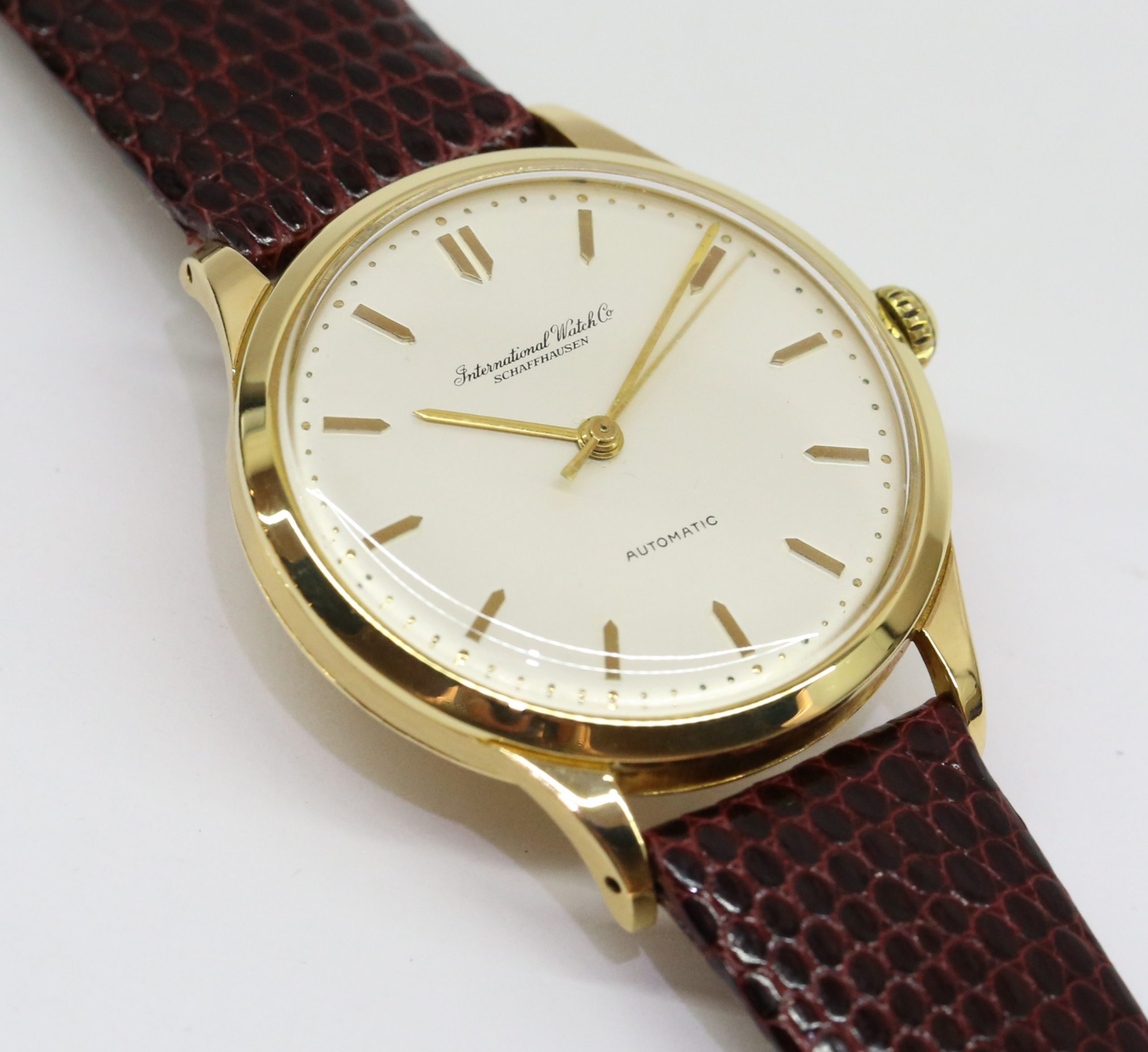 IWC classic automatic Cal 853 in 18k yellow gold, original silver/white dial with applied gold markers, on a Brown Lizard Strap Ca. 1960's