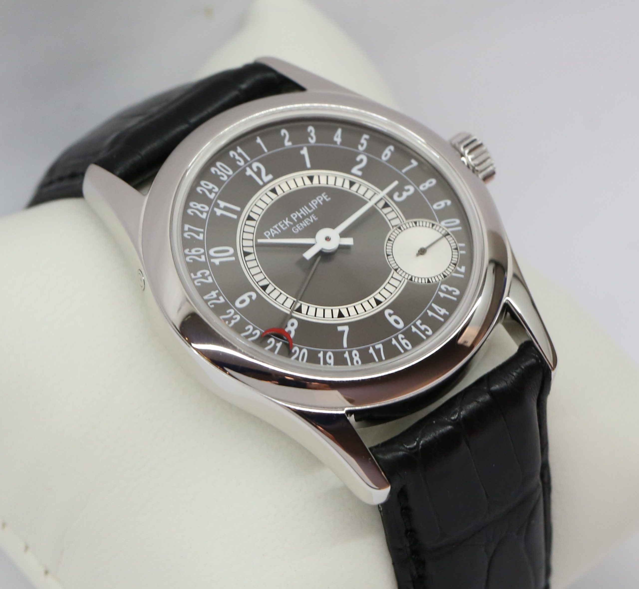 Patek Philippe Calatrava in 18ct White Gold, Pointer Date on Strap with Black Dial Ref. 6000G-010 Circa: 2007 Complete with Box and Papers Just returned from Patek Philippe Service