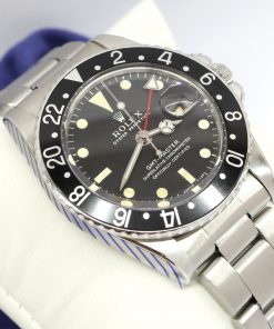 Rolex GMT Master, Stainless Steel, Black Bezel, Matte Black Tritium Index Dial on Rolex Oyster Bracelet, Reference 1675, Circa: 1969, with Box & Rolex Service Card