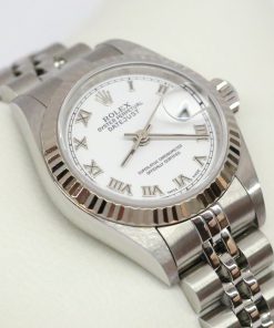 Rolex Datejust 26mm Stainless Steel with 18ct White Fluted Bezel, White Roman Dial, on Rolex Jubilee Bracelet, Reference 79174, Circa: 2000, Complete with Box & Papers