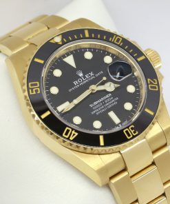 Rolex Submariner Date current model 41mm in 18ct Yellow Gold, Black Index Dial, Black Ceramic Bezel, 18ct Yellow Gold on Rolex Oyster Bracelet, Reference 126618LN, with Box & Papers