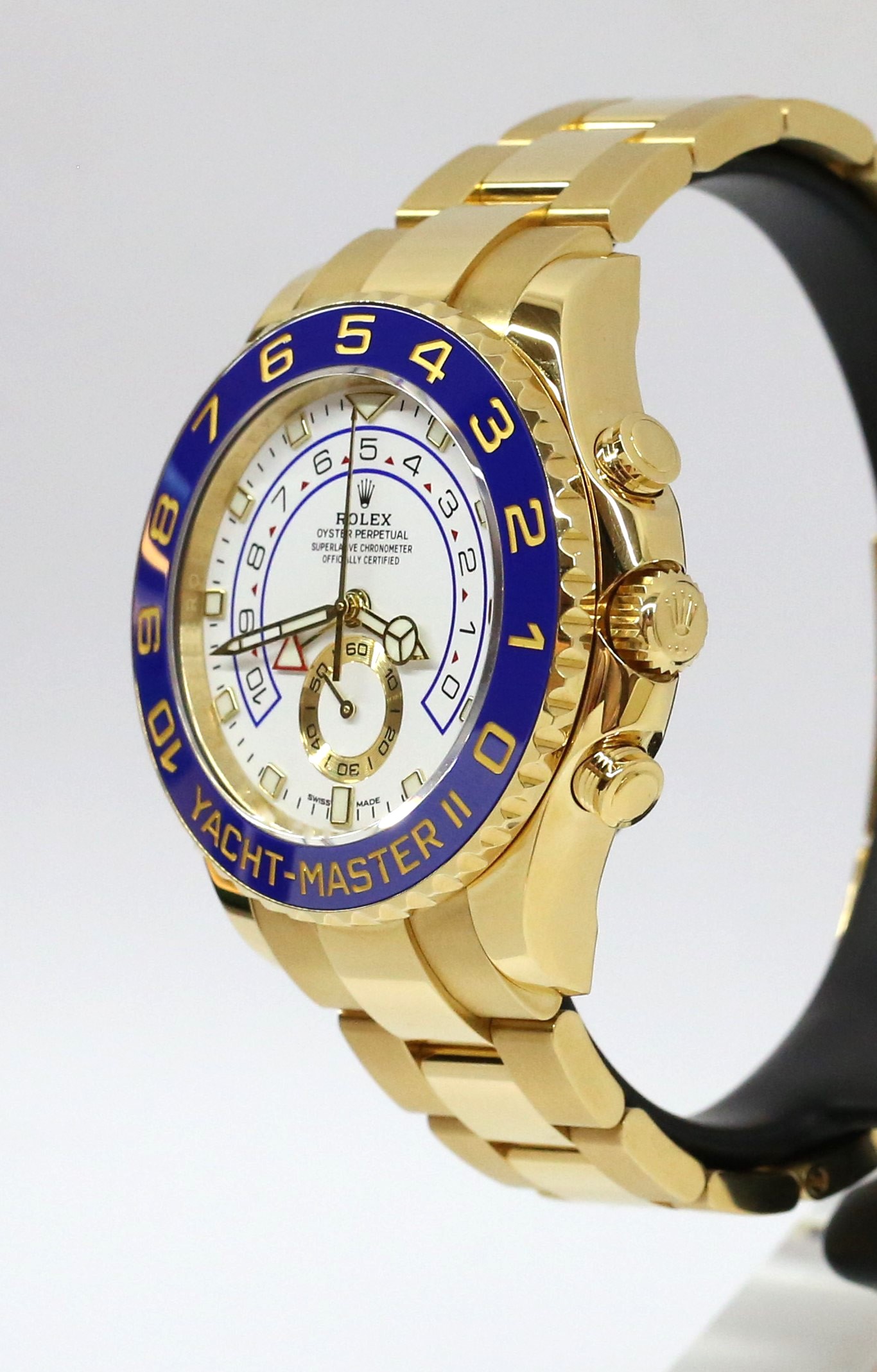 Rolex Yachtmaster II 44mm in 18ct yellow gold, White index dial, Blue ceramic bezel on a Rolex 18ct Yellow gold Oyster bracelet. Box and Papers Ca. 2018 - Image 2