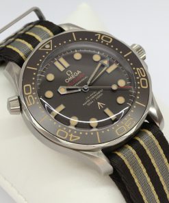 Omega Seamaster Diver 300m 007 Edition, in Titanium, Brown tropical aluminium bezel ring and dial on Omega Nato Strap, Reference: 210.92.42.20.01.001, Circa: 2020, with Box & Papers