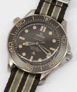 Alternative view of Omega Seamaster Diver 300m 007 Edition, in Titanium, Brown tropical aluminium bezel ring and dial on Omega Nato Strap, Reference: 210.92.42.20.01.001, Circa: 2020, with Box & Papers