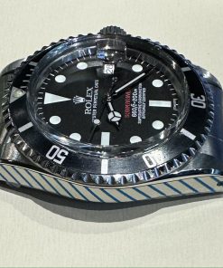 Alternative view of Rolex Oyster Perpetual Date Submariner Case reference 1680, Ca 1973, Mk 7 Red Luminova dial.