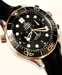 Omega Seamaster Diver 300M Co-Axial Master Chronometer Chronograph in Steel - Sedna Gold on Rubber strap, black ceramic bezel, Box and books, under Omega Factory Warranty Ca. 2022