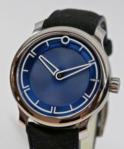 Alternative view of Ming Blue Ref 17.09 in stainless steel, high polish on a Black alcantara strap with blue alcantara lining