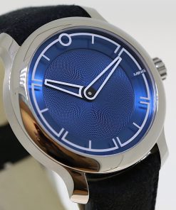 Ming Blue Ref 17.09 in stainless steel, high polish on a Black alcantara strap with blue alcantara lining