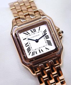 Panthère de Cartier watch, medium model, quartz movement in 18ct rose gold, silvered dial, blued-steel sword-shaped hands, 18ct rose gold bracelet, Ref: WGPN0007