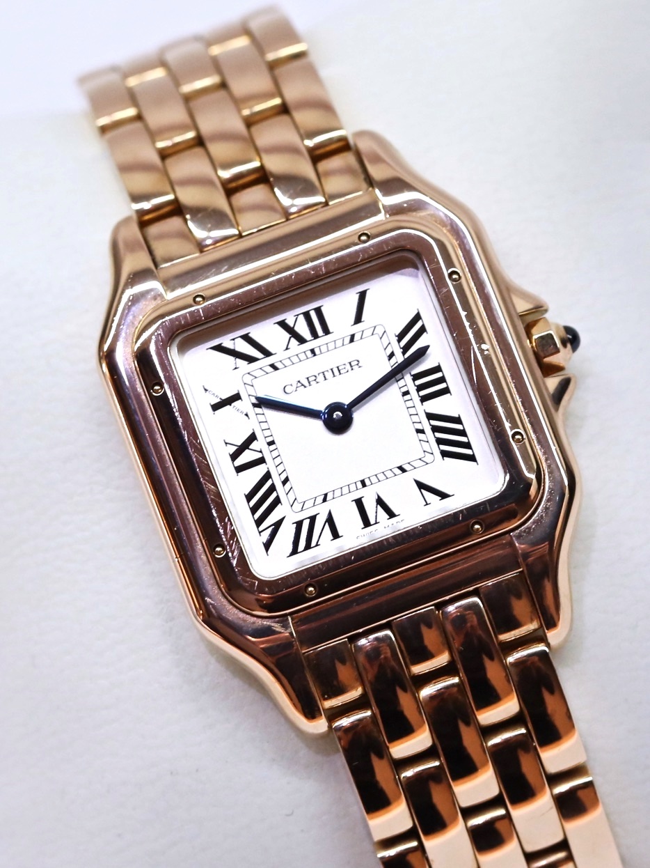 Panthère de Cartier watch, medium model, quartz movement in 18ct rose gold, silvered dial, blued-steel sword-shaped hands, 18ct rose gold bracelet, Ref: WGPN0007