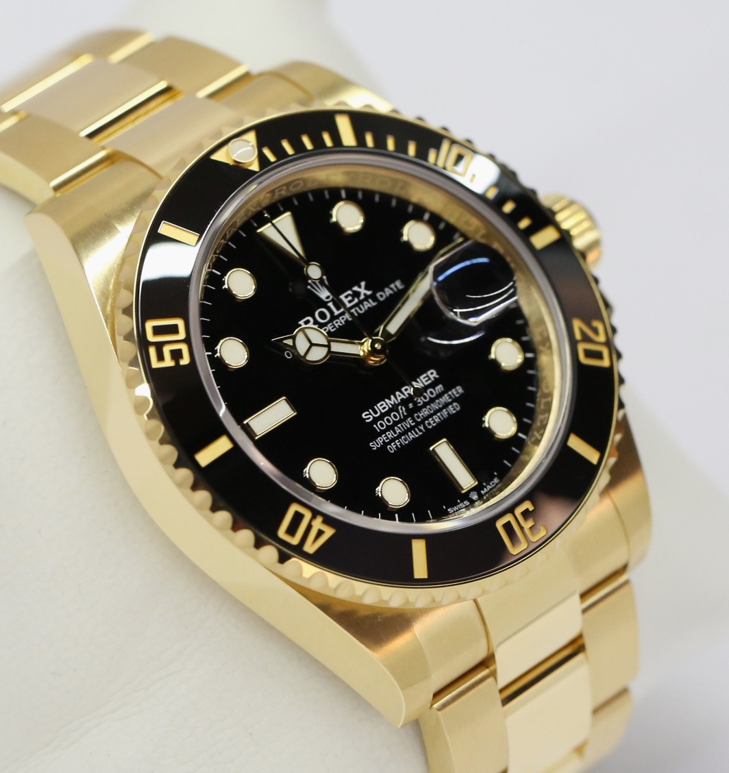 Rolex Submariner Date in 18ct Yellow Gold on 18ct Yellow Gold Rolex Oyster Bracelet, Black Index Dial, Black Ceramic Bezel, Ref: 126618LN, with Box, Book, Swing tags & Rolex Warranty card