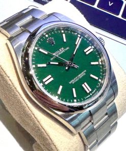 Rolex Oyster Perpetual OP41 Green dial Ref 124300 2022
