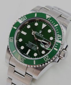 Alternative view of Rolex Submariner Date "HULK" in stainless steel, Rolex Oystersteel bracelet, Ref 116610LV, Service by Rolex last year, over 12 months remaining on service. Box and Books, Rolex Service Card