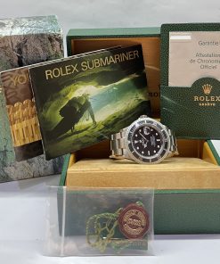 Alternative view of Rolex Submariner Date in Stainless Steel on Rolex Stainless steel Flip lock Oyster Bracelet, Black Index Dial, Complete with the Inner & Outer box, Rolex Warranty certificate and swing tags. Reference: 16610, Circa 2004